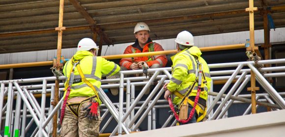 Construction workers on scaffolding