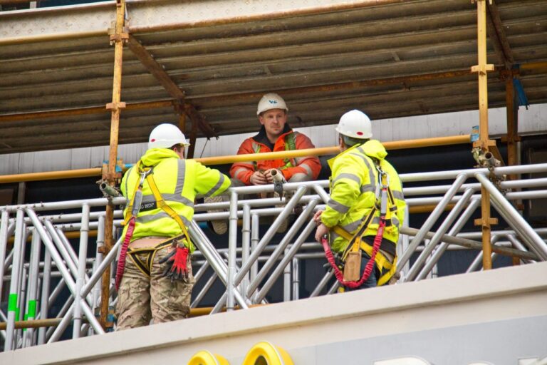 Construction workers on scaffolding